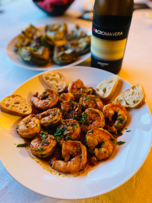 A photograph of Gambas Al Ajillo (Spanish Garlic Shrimp) and Croma Vera's Albariño.