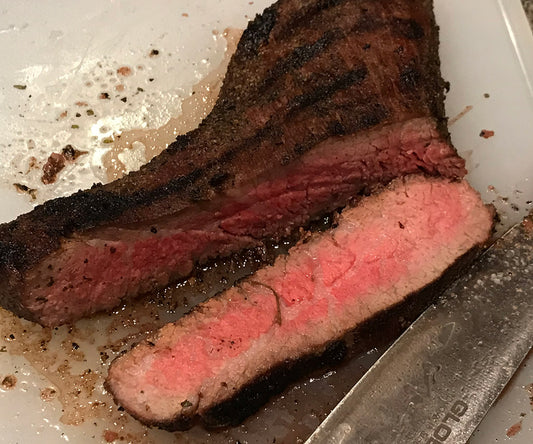Tri-tip sliced on a cutting board